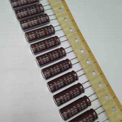 TD04RLXV100VB100M 100MF 100V 10x30 105 NIPPON ELKO KONDANSATÖR resmi