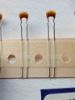 C324C101J1G5TA7301 100PF 50V 5mm MULTİ KEMET SERAMİK KONDANSATÖR resmi