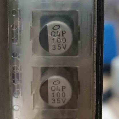 UUX1V101MNQAMOGS 100MF 35V 10x10 NICHICON SMD KONDANSATÖR resmi