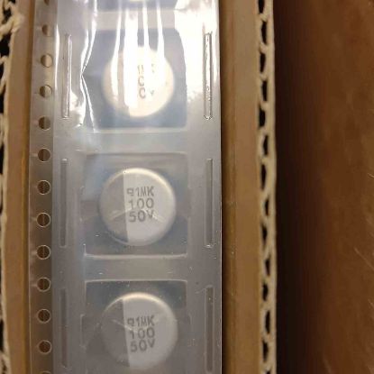 2416RMVK50VC100M 100MF 50V 10x10 SMD KONDANSATÖR resmi