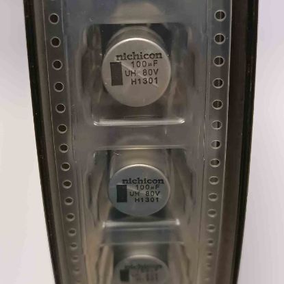 UUH1K101MNQACTNS 100MF 80V 12x12 NICHICON SMD KONDANSATÖR resmi
